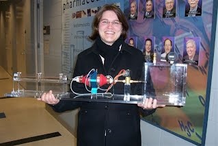 Jennifer Fiegel holding her new simulated cough machine