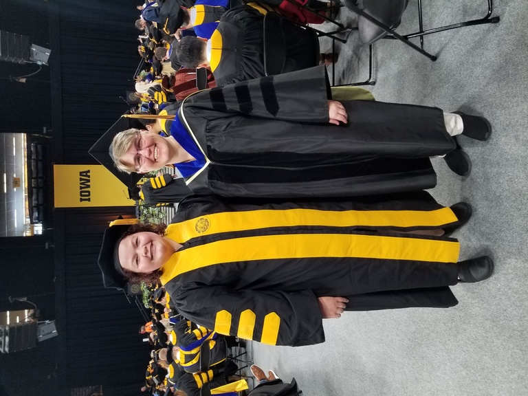 Riannon Smith poses for a photo with Jennifer Fiegel at graduation