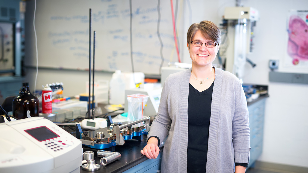 Jennifer Fiegel poses for a photo in her lab